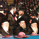 Members of the World Rabbinical Council, moments after voting to end 6,000 years of ham prohibition.